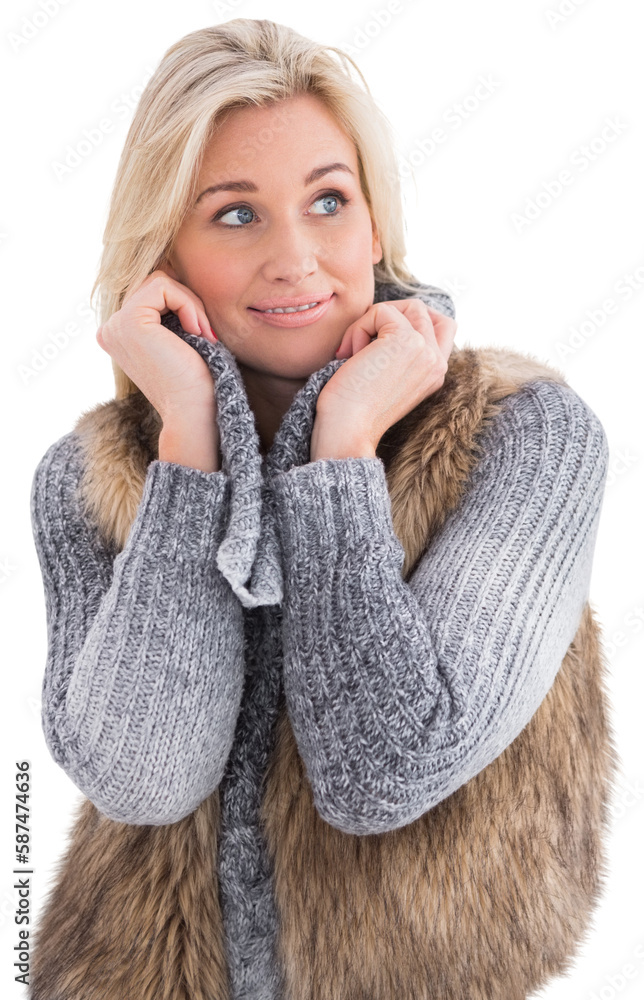 Blonde in winter clothes smiling Blonde in winter clothes smiling