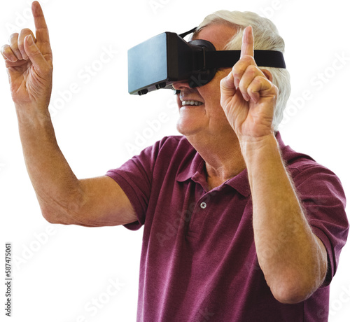 Happy senior man dancing while using virtual reality glasses