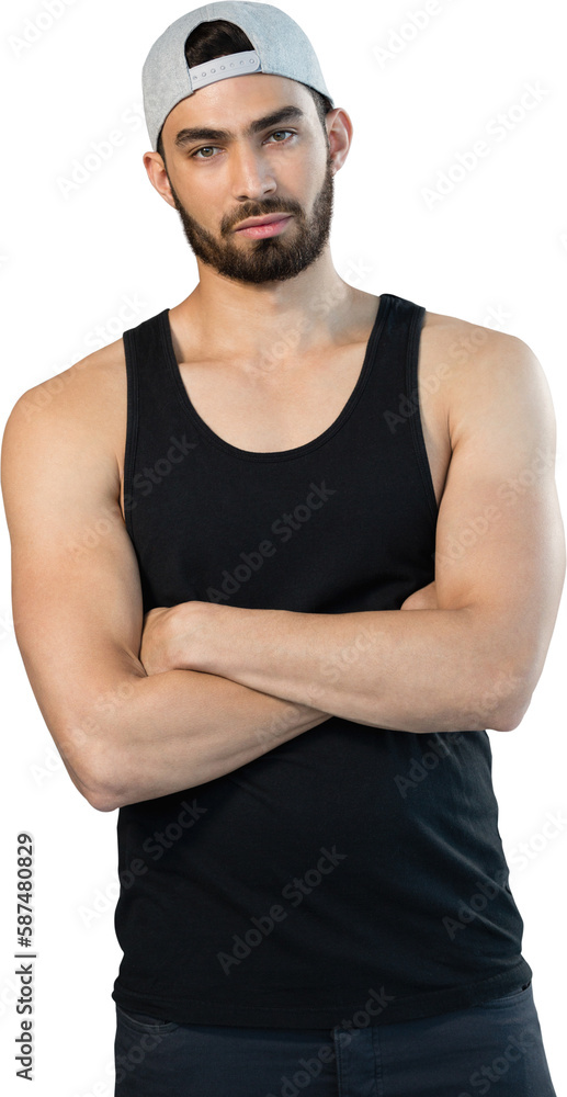 Handsome man posing with arms crossed against grey background Handsome man posing with arms crossed against grey background