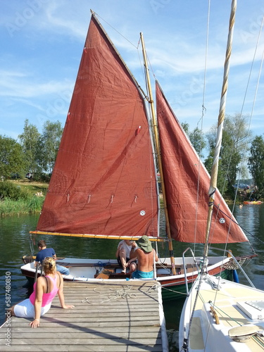 Sailboat with brown sails photo