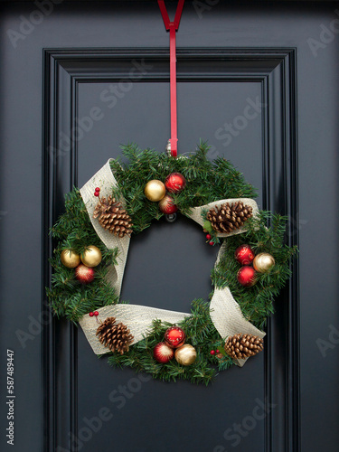 Christmas wreath on front door of home at Christmas time. photo