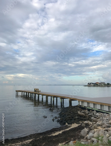 Fishing Pier in Florida with riprap at water's edge © forestpath