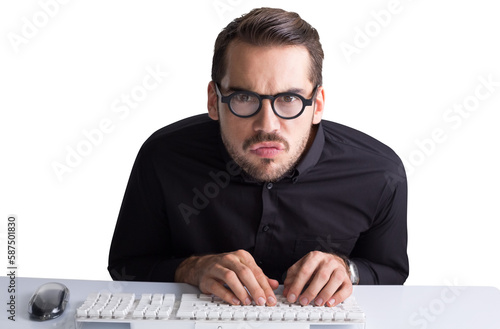 Concentrated businessman with glasses typing on keyboard