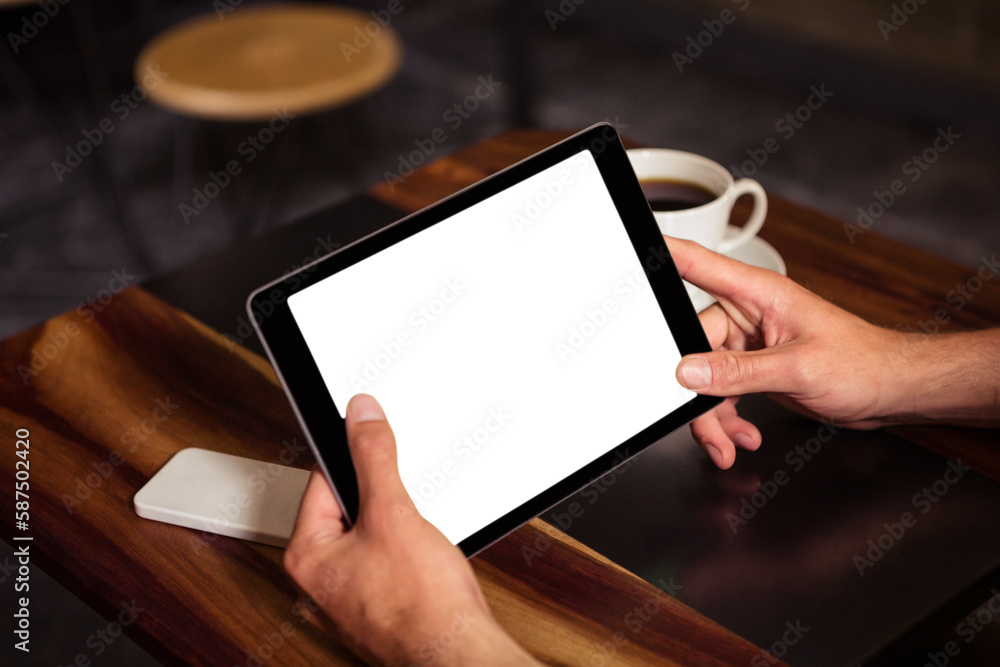 Cropped image of man holding tablet Cropped image of man holding tablet