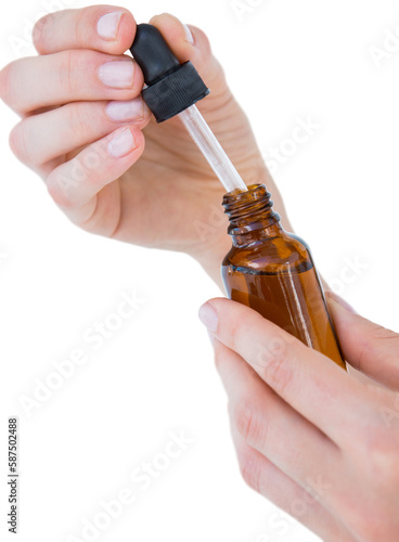 Woman holding bottle of medicine