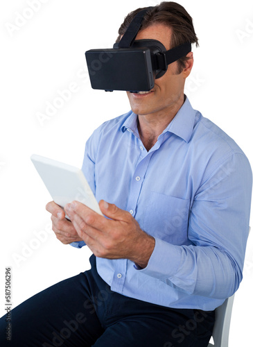 High angle view of businessman with tablet using vr glasses