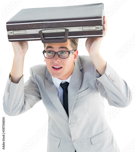 Geeky businessman holding his briefcase over head