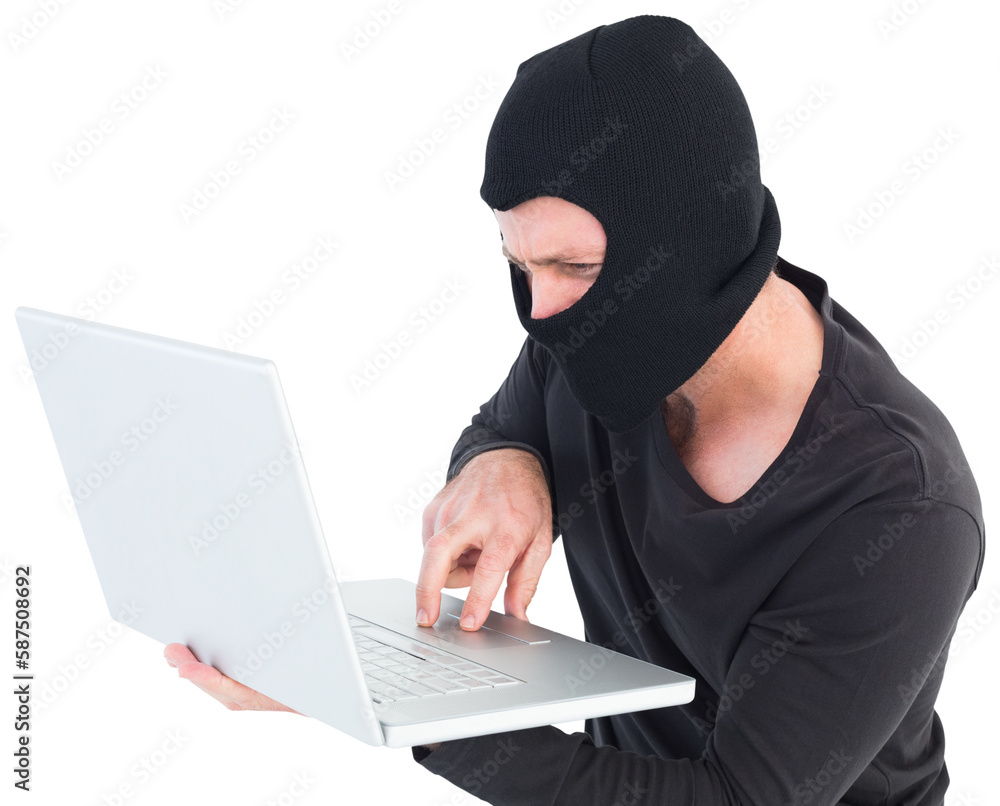 Hacker using laptop to steal identity Hacker using laptop to steal identity