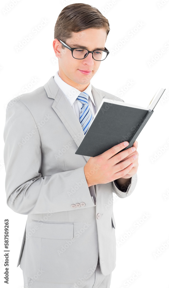Geeky businessman reading black book Geeky businessman reading black book