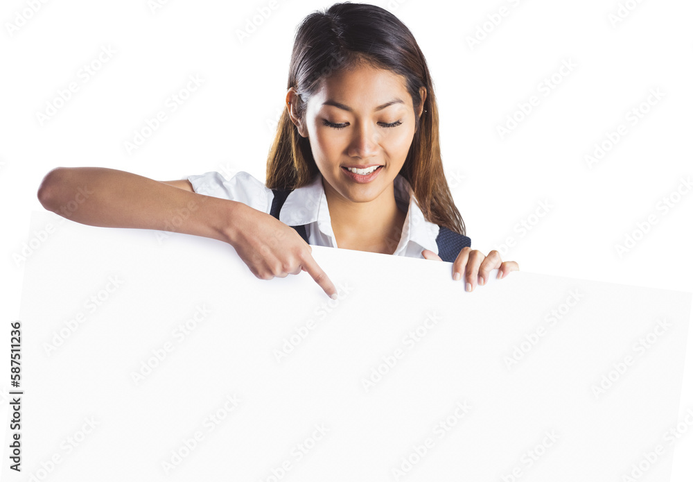 Smiling businesswoman pointing a white poster Smiling businesswoman pointing a white poster
