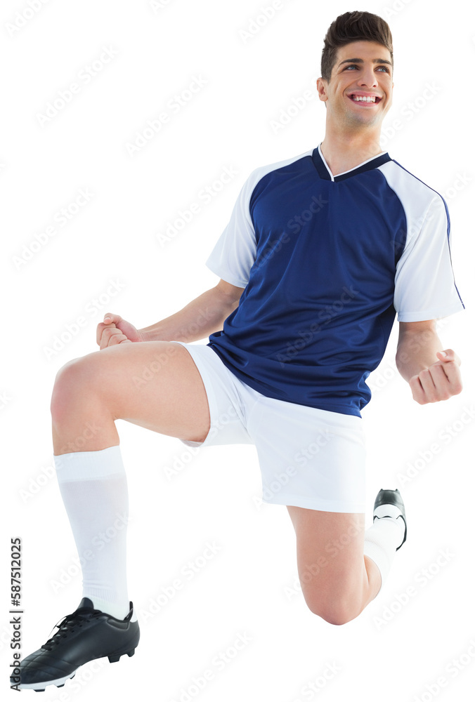 Football player rejoicing while kneeling Football player rejoicing while kneeling