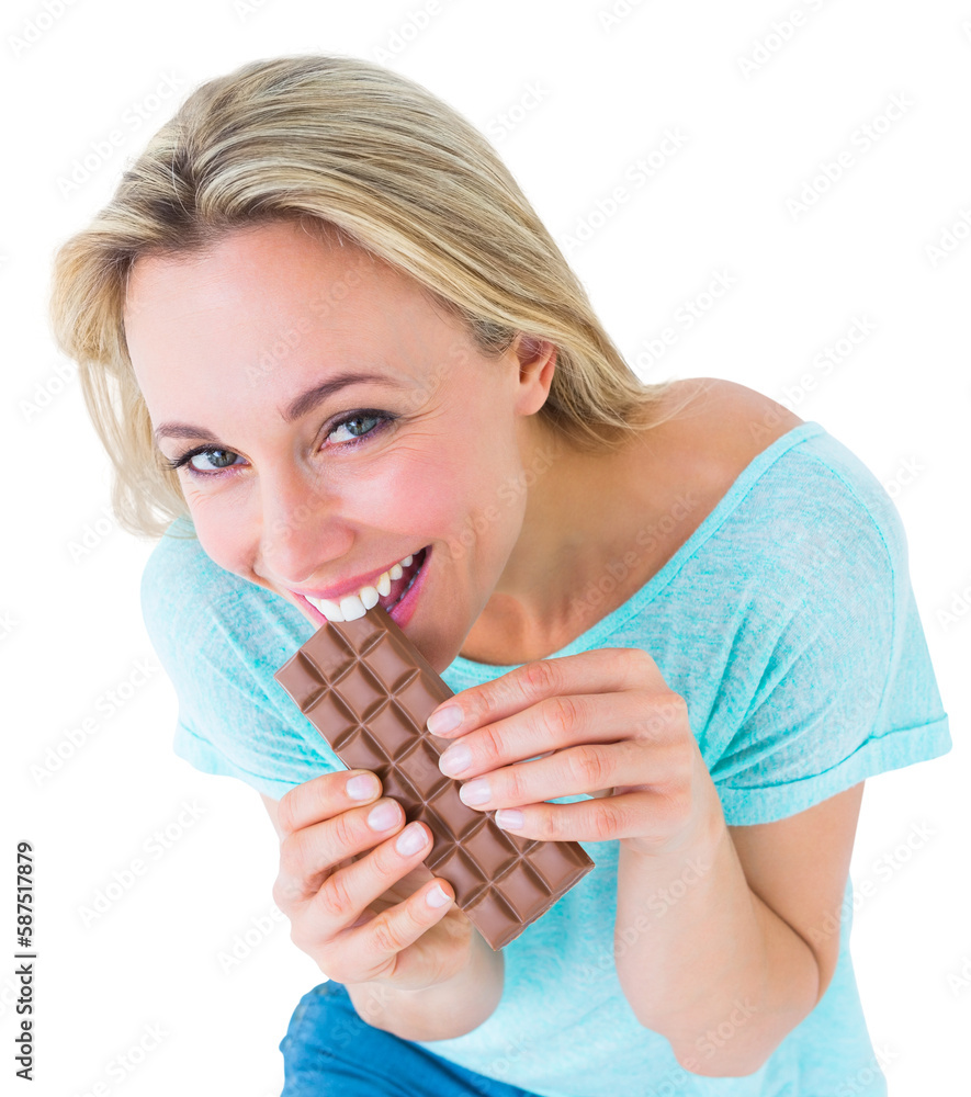 Pretty blonde eating bar of chocolate Pretty blonde eating bar of chocolate