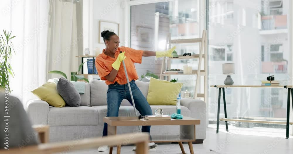Happy, cleaning and music with black woman in living room for singing, dance and relax. Hygiene, sanitary and housekeeping with cleaner listening to song at home for sound, freedom and domestic maid
