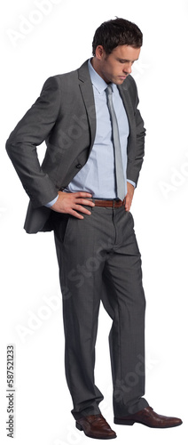 Serious businessman with hands on hips