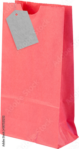 Close up of coral colored shopping bag with price tag