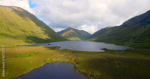 Idyllic view of lake and mountains © vectorfusionart