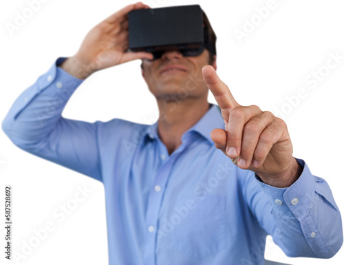 Businessman pointing while using virtual reality simulator