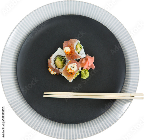 Close up of food with chopstick in plate