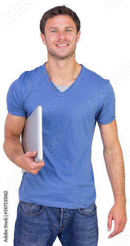 Smiling man with closed laptop