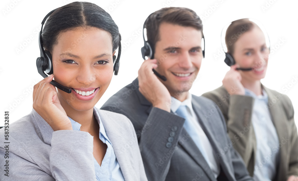 Business people with headsets using computers Business people with headsets using computers