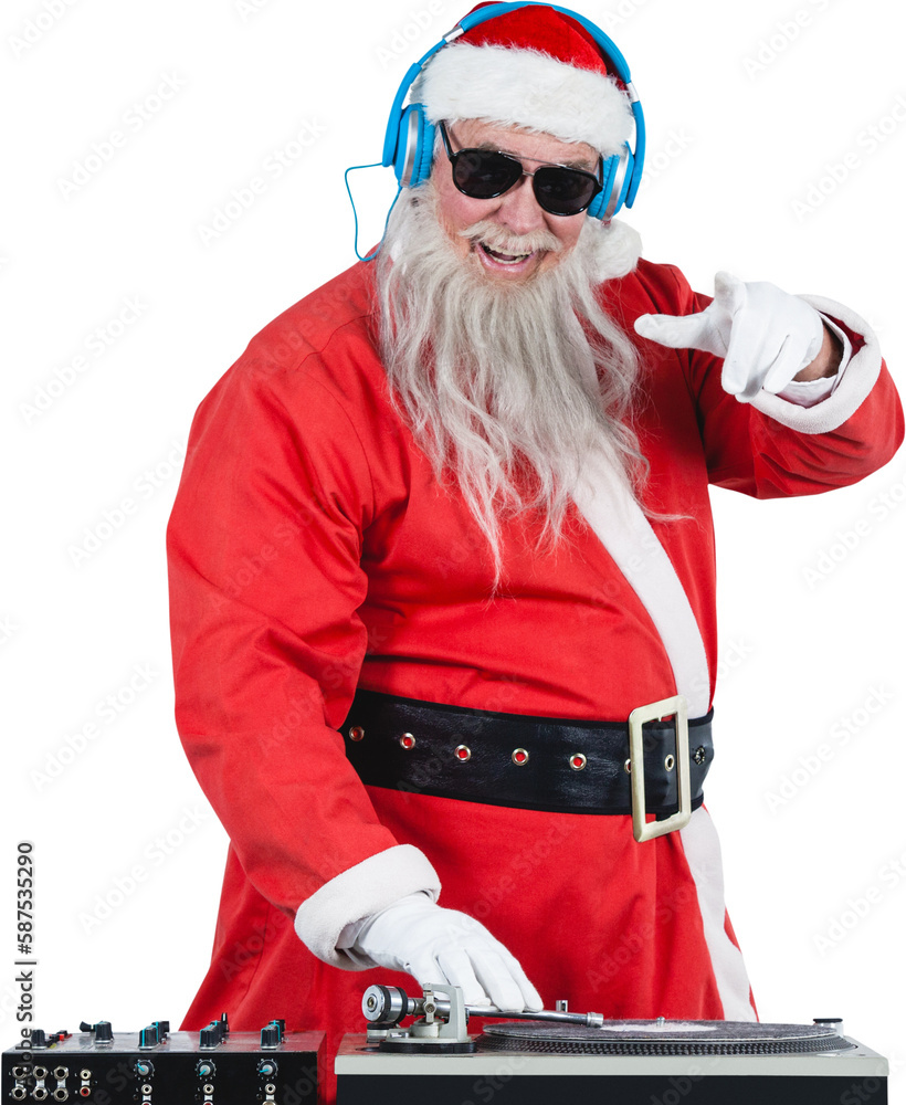 Obraz premium Santa Claus playing sound mixer