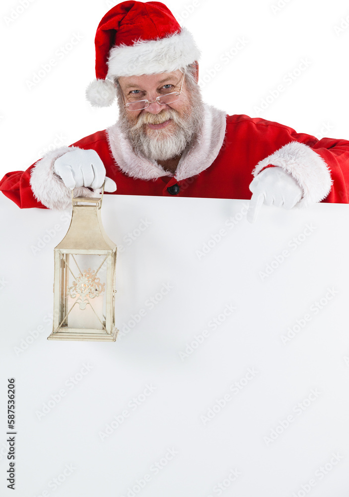 Naklejka premium Santa Claus holding Christmas lantern