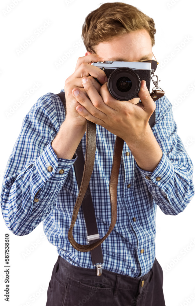 Geeky hipster holding a retro camera Geeky hipster holding a retro camera