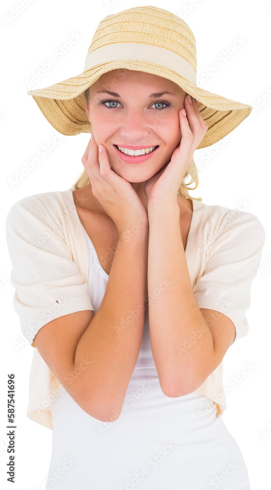Attractive young blonde smiling at camera in sunhat Attractive young blonde smiling at camera in sunhat
