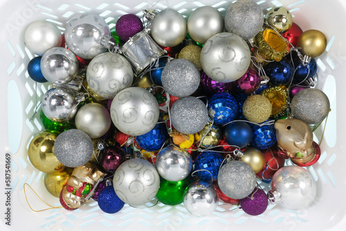 Christmas baubles in palstic basket