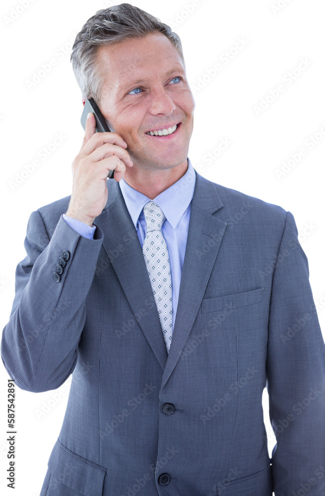 Smiling businessman talking on mobile phone Smiling businessman talking on mobile phone