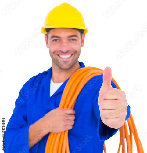 Electrician with rolled wire gesturing thumbs up