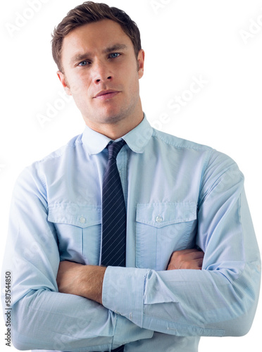 Elegant businessman with arms crossed in office