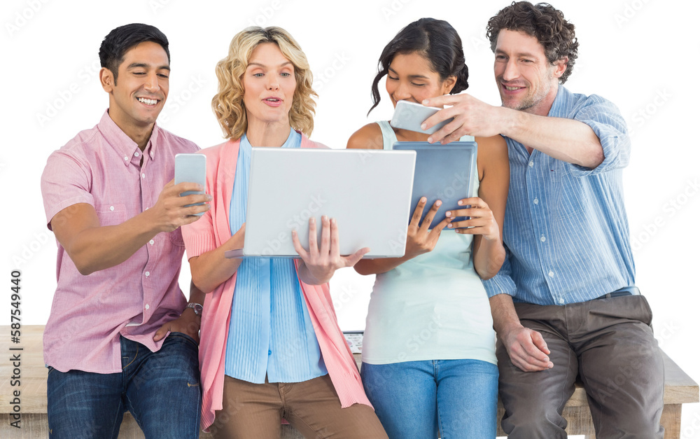 Casual businesspeople using digital tablet with colleagues behind in office Casual businesspeople using digital tablet with colleagues behind in office