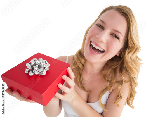 Portrait of a happy woman receiving a present