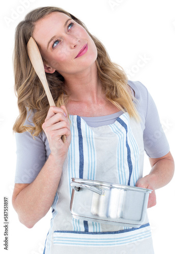 Thoughtful woman holding saucepan 