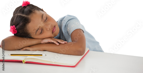 Fotografi Girl napping on book at desk