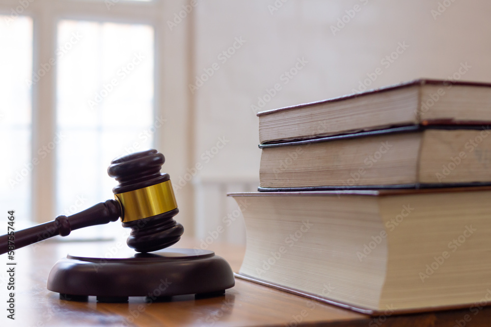 wooden judge gavel on table as symbol of justice for use in legal cases judicial system and civil rights and social justice concept with judge. concept of legislation to judge lawsuits with justice. wooden judge gavel on table as symbol of justice for use in legal cases judicial system and civil rights and social justice concept with judge. concept of legislation to judge lawsuits with justice.