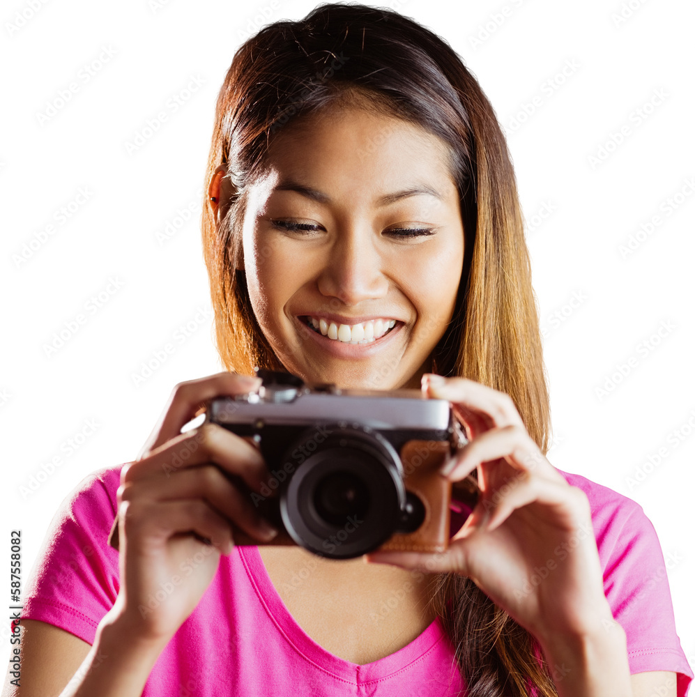 Smiling asian woman taking picture with camera Smiling asian woman taking picture with camera