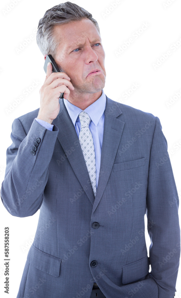 Confused businessman talking on mobile phone Confused businessman talking on mobile phone