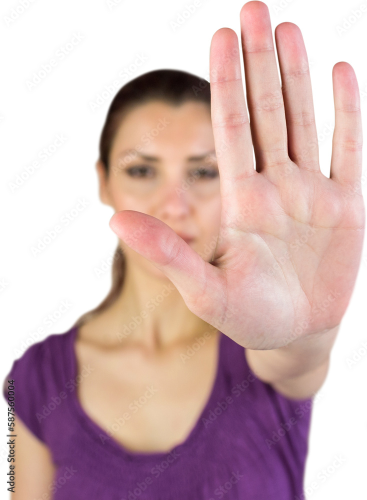 Portrait of woman showing stop sign Portrait of woman showing stop sign