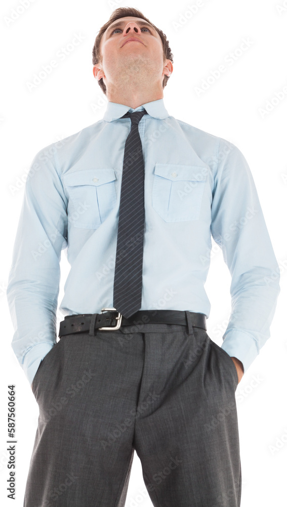 Serious businessman standing with hands in pockets Serious businessman standing with hands in pockets