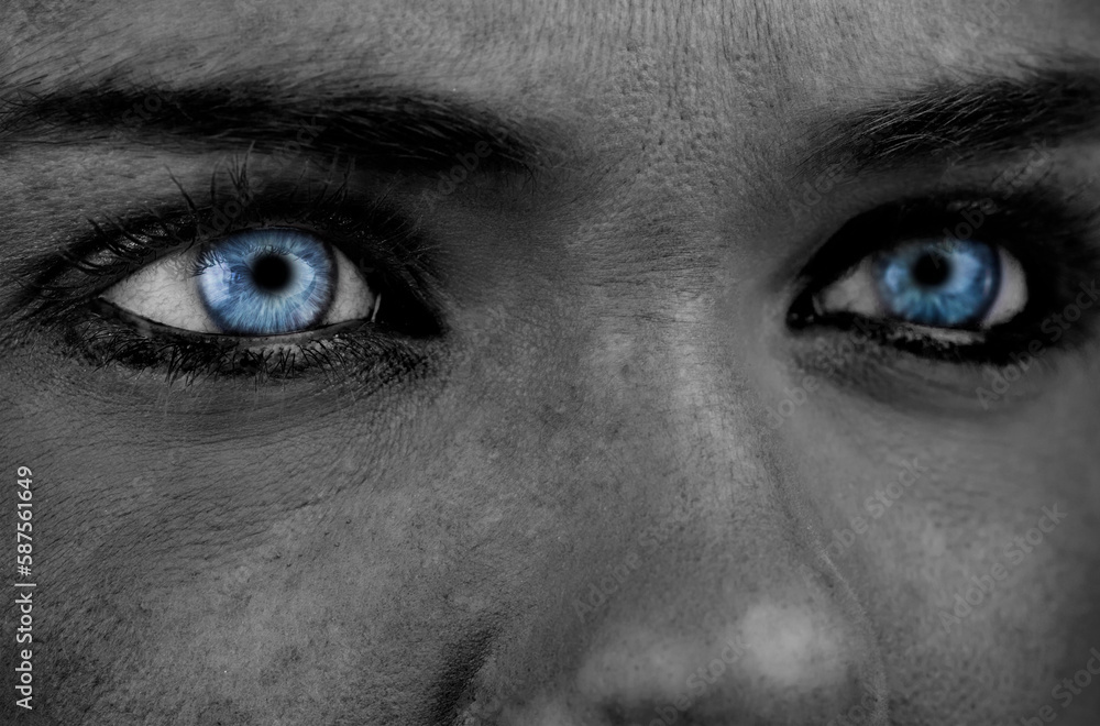 Fototapeta premium Blue eyes on grey face