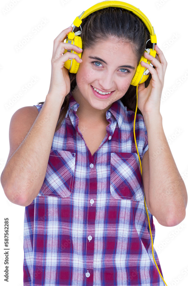 Beautiful woman enjoying music through headphones Beautiful woman enjoying music through headphones