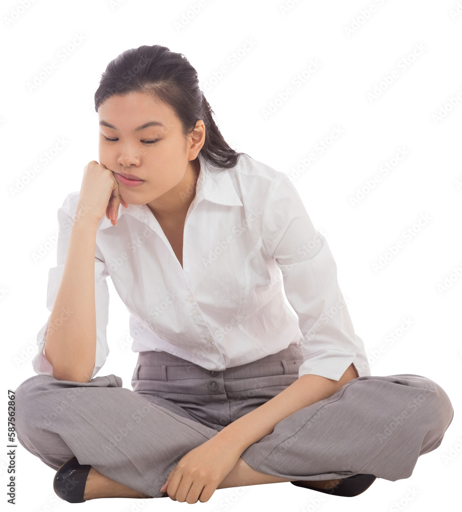 Grumpy businesswoman sitting cross legged Grumpy businesswoman sitting cross legged