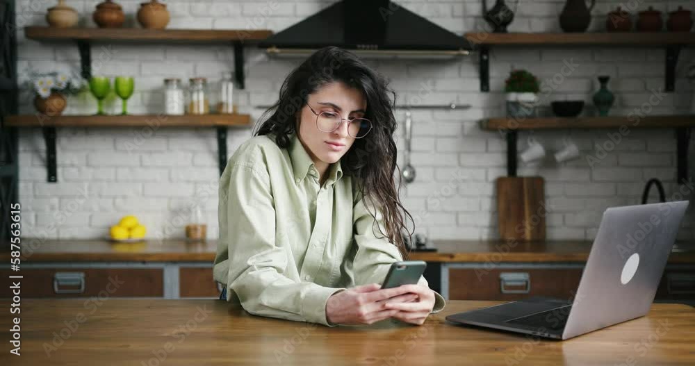 Transgender woman scrolls social media on smartphone Transgender woman scrolls social media on smartphone