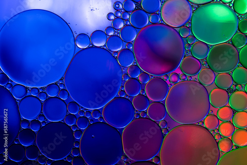 Macro close up of water bubbles with copy space over multi coloured background