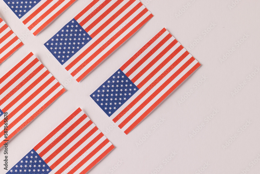 High angle view of rows of flags of united states of america with copy space on white background High angle view of rows of flags of united states of america with copy space on white background