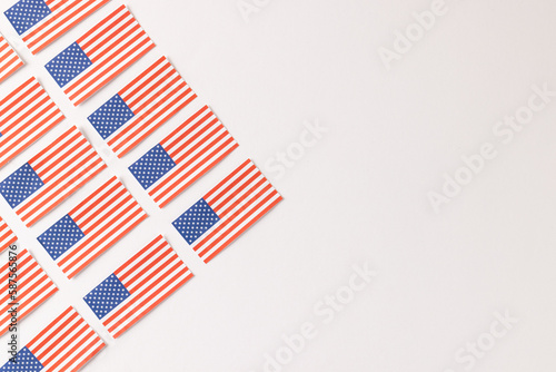 High angle view of rows of flags of united states of america with copy space on white background