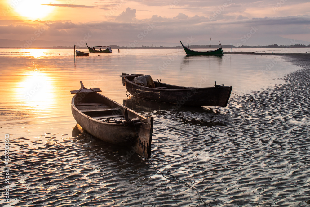 Fishing boat at sunrise