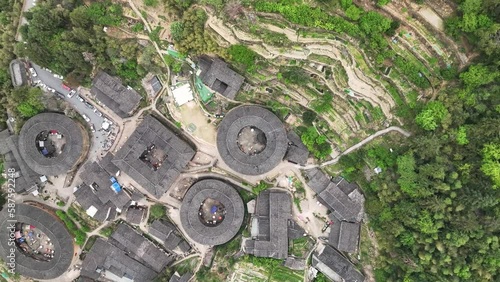 The Fujian earthen buildings (also known as Hakka tulou) in mountains. These buildings are in Tianluokeng village. photo